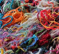 Bits of natural fiber yarn swap