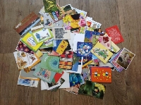  5 unwritten postcards in an envelope 
