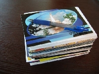 4 random postcards in an envelope, 2 partners